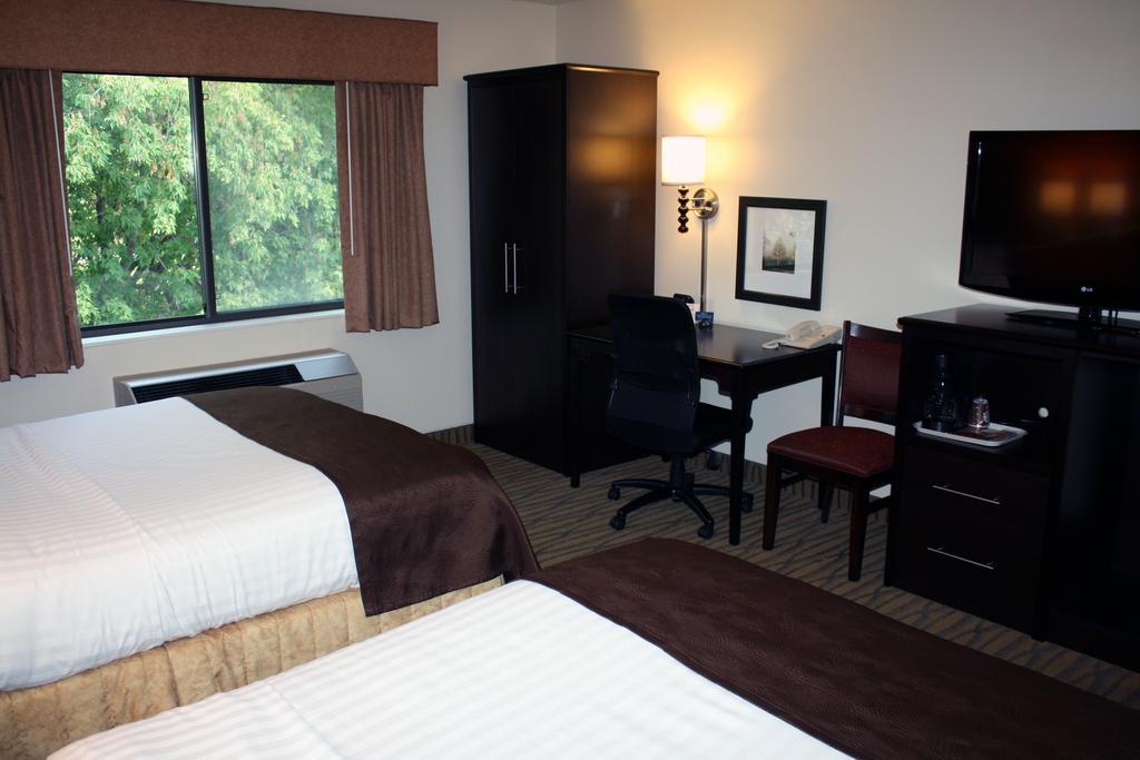Americinn By Wyndham Rogers Habitación foto